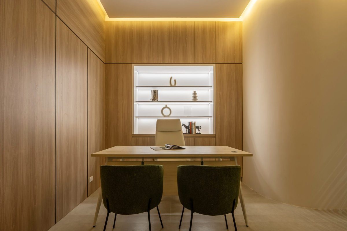 Private consultation room with warm wood interior at Greenfield Dental
