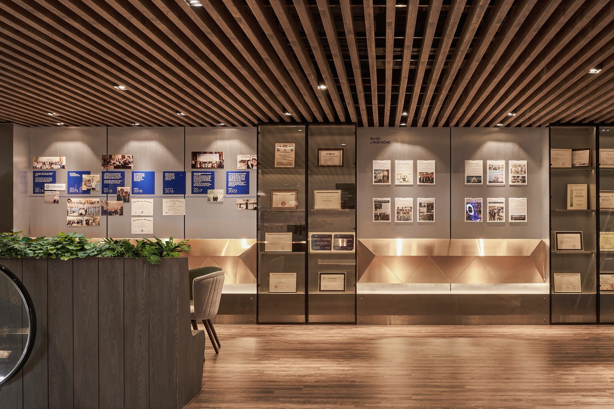 Awards and certifications wall at Minh Thu Dental Clinic