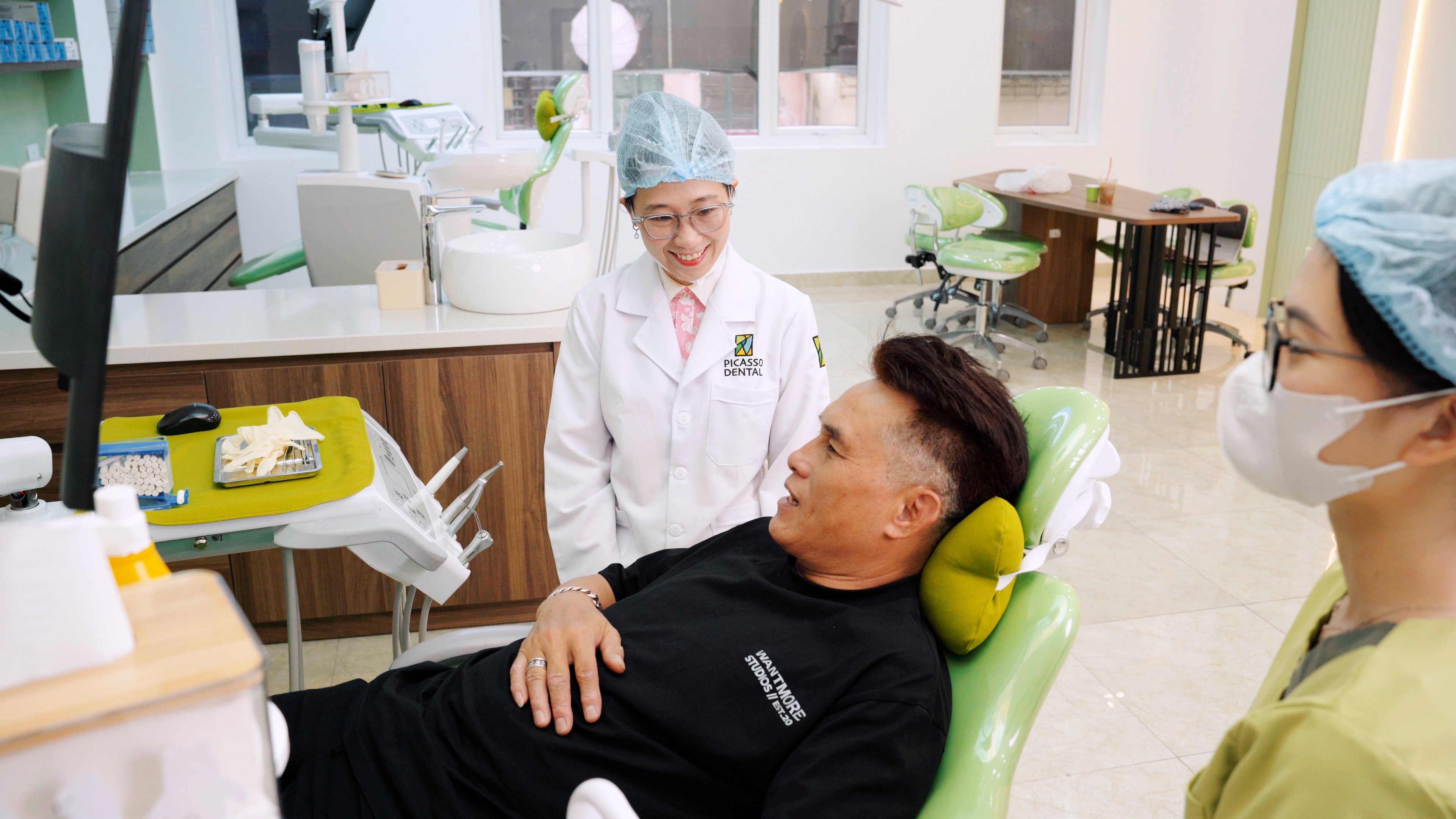 Picasso Dental vs Australian Dental Clinic -- Hanoi Comparison 2026